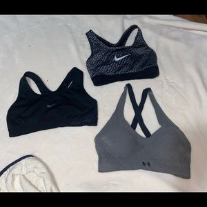 Two Nike and one under armor sports bra bundle